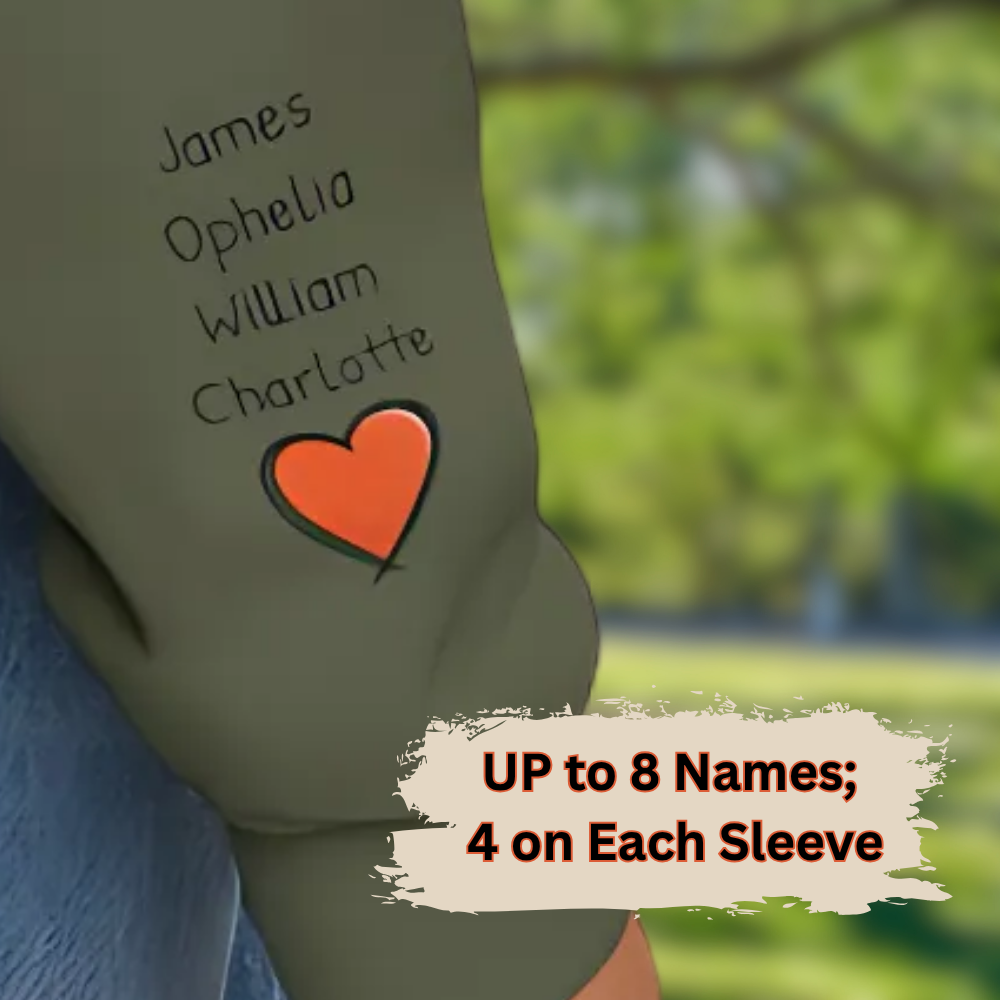 Green sleeve with names written on it, featuring a heart design, against a blurred green outdoor background.