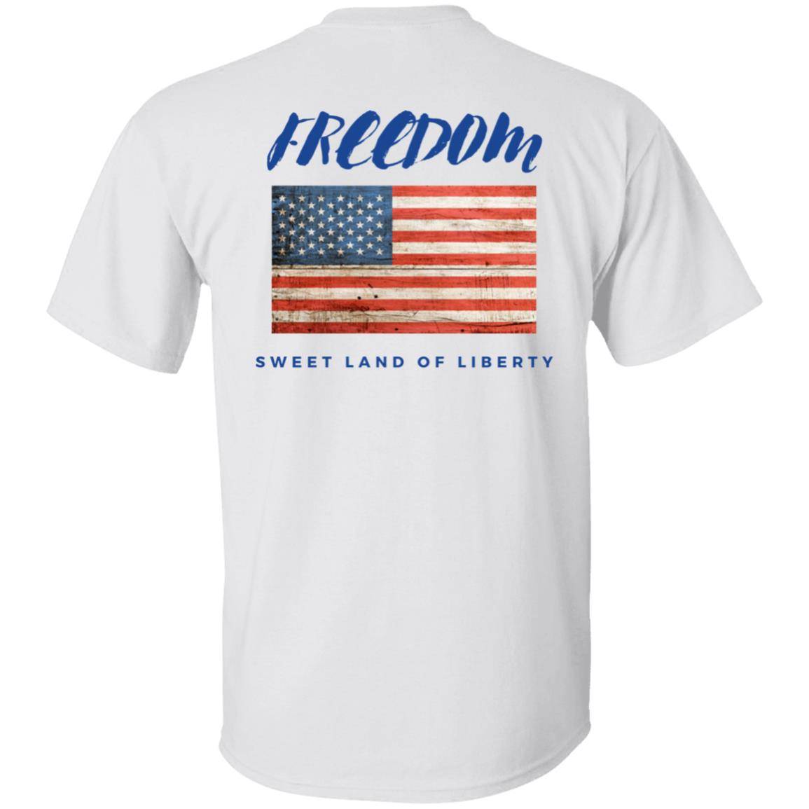 White, heavyweight classic unisex t-shirt in 100% cotton. Freedom is written across the chest back with a grunge American flag below it and written beneath that is Sweet Land of Liberty.