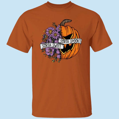 Orange unisex t-shirt. with a Halloween image on the chest, half of which are flowers while the other half is a scary pumpkin. A ribbon is wrapped around the image, reading, Sorta Sweet, Sorta Spooky - Any Gift For You