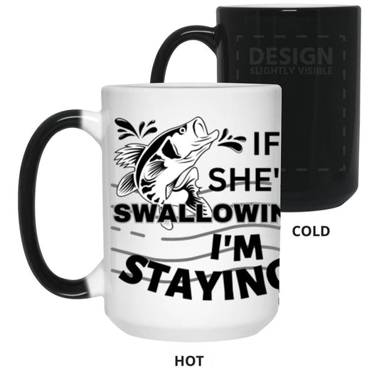 This 15 oz. ceramic mug is decorated with a full wrap graphic, revealed when hot water is added. Mugs are a slightly softer black than shown where the design is printed, and the AAA coating ensures maximum vibrancy of the print. Not dishwasher safe, the mug is microwave safe and decorated with sublimation. On the mug is a picture of a fish jumping out of the water with the text: If she's swallowing, I'm staying