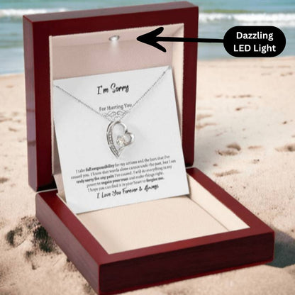 I'm Sorry Forever Love Necklace with 14k white gold finish in a mahogany style box showing LED light - Any Gift For You