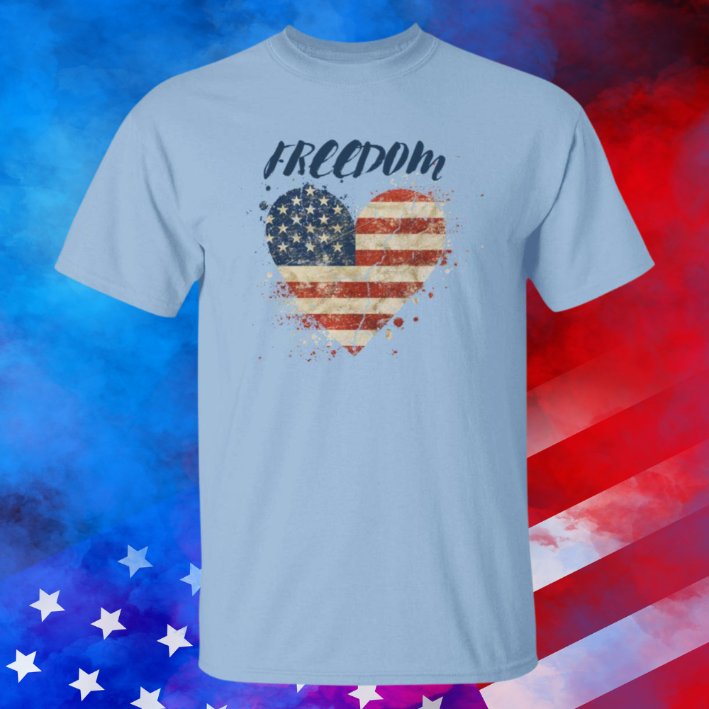 Light blue, heavyweight classic unisex t-shirt in 100% cotton. Freedom is written across the chest with an American grunge flag in the shape of a heart beneath - Any Gift For You