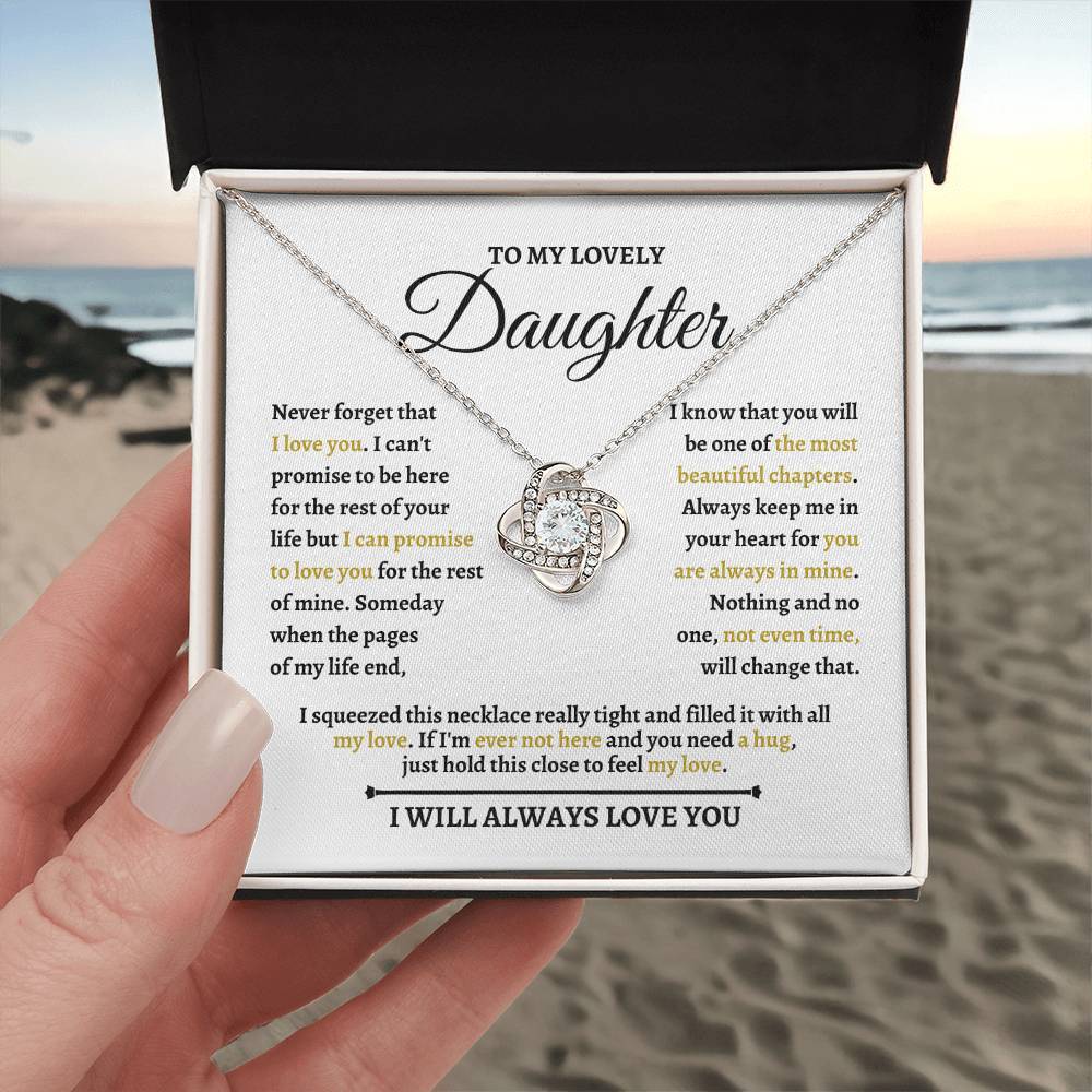 Beautiful Love Knot Necklace in 14K white gold over stainless steel. The Love Knot represents an unbreakable bond between two souls. This piece features a beautiful pendant embellished with premium cubic zirconia crystals. Surprise your loved one with this gorgeous gift today!
