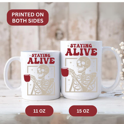 Image showing 11 and 15oz Staying Alive Skeleton Coffee Mugs in white